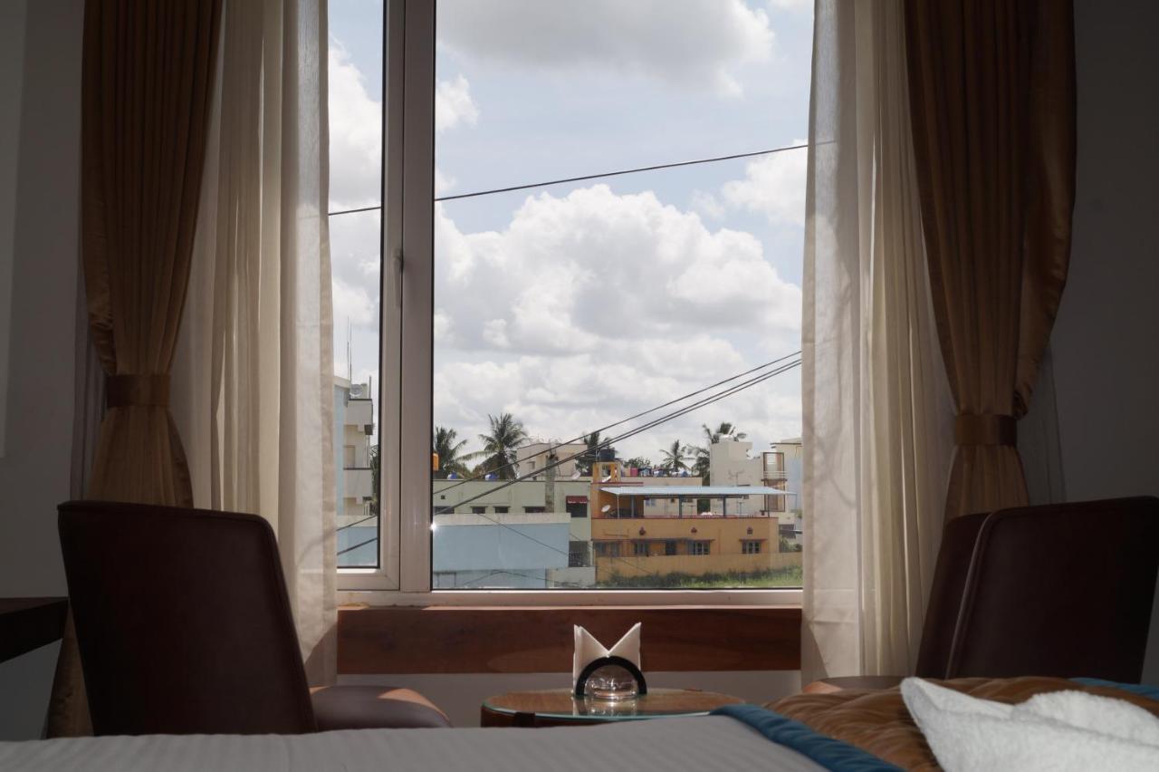 Hotel Varun Mansion Хасан Екстериор снимка
